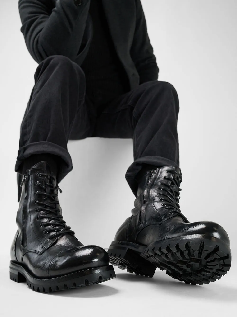 CAMDEN tar-black double-zip military boots.